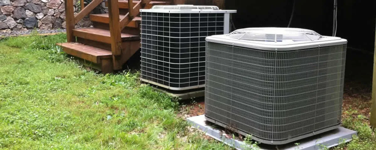 Heat pump installation and service units outside a home in Tampa, FL