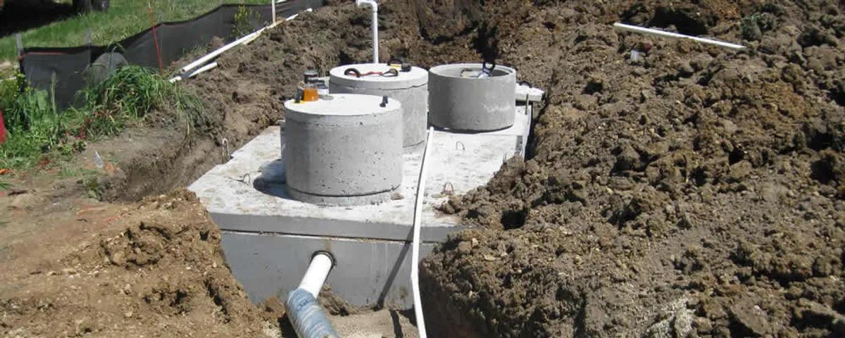 Septic system repair and installation site with tank access ports in Tampa, FL
